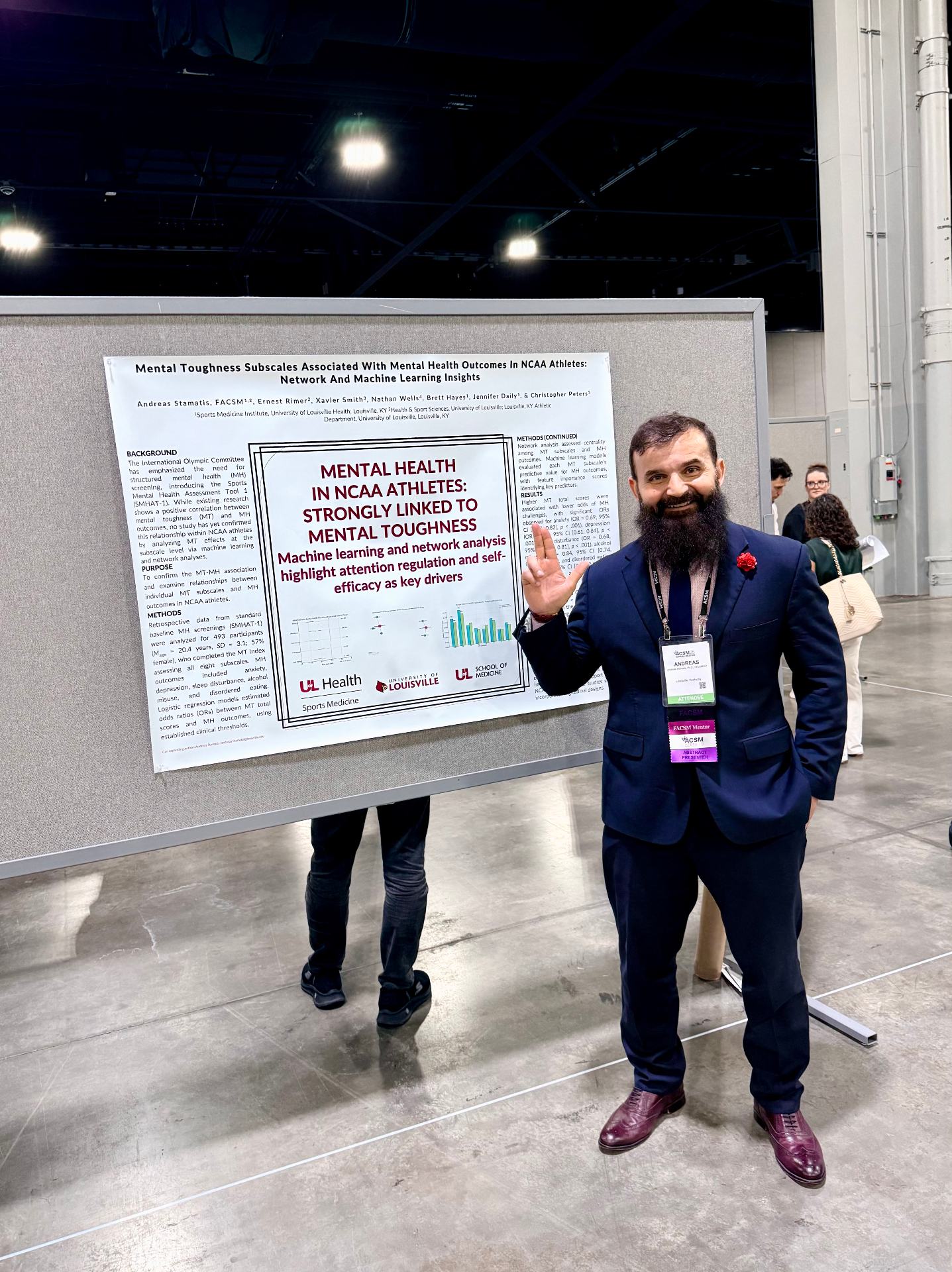Andreas Stamatis with research poster on mental health and mental toughness in NCAA athletes